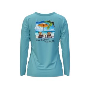 Women's Toast the Tide long sleeve performance shirt. Tropical beach scene with chairs